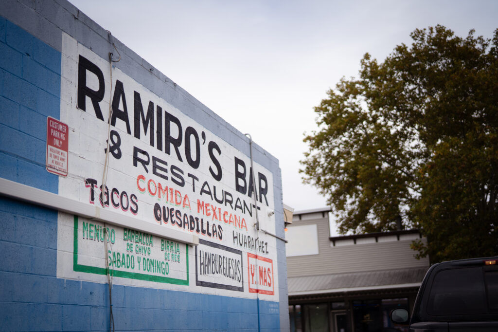10-30-24 Ramiro’s-1 Exterior of a wall featuring information about Ramiro's Bar