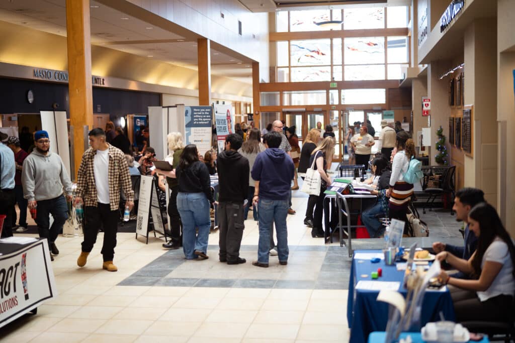 The hallway at Big Bend Community College's Job Fair full of interactions from multiple partners to young adults